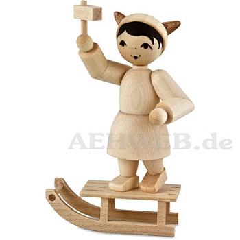 Girl on sledge with ratchet, natural wood