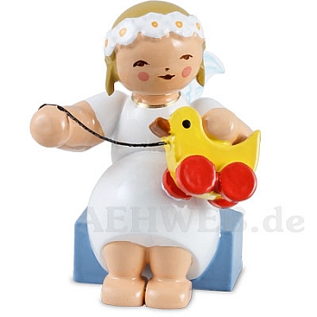 Marguerite angel sitting with Toy Duck