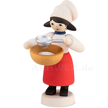 Winter child cookie baker girl with sieve stained