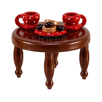 Coffee table with red dishes from Ulmik