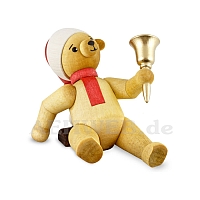 Christmas bear lying with bell