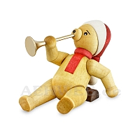 Christmas bear lying with Trumpet