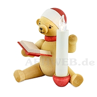 Christmas bear with book and candle