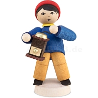 Winter child boy with coffee grinder stained
