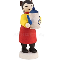 Winter child girl with coffee pot stained