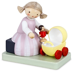 Girl with doll and doll's pram